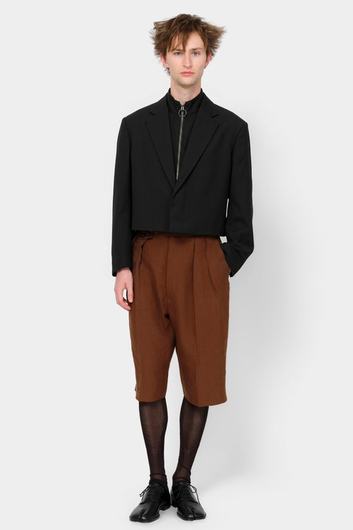 CUT-OFF OVERCOAT in black wool-silk mix