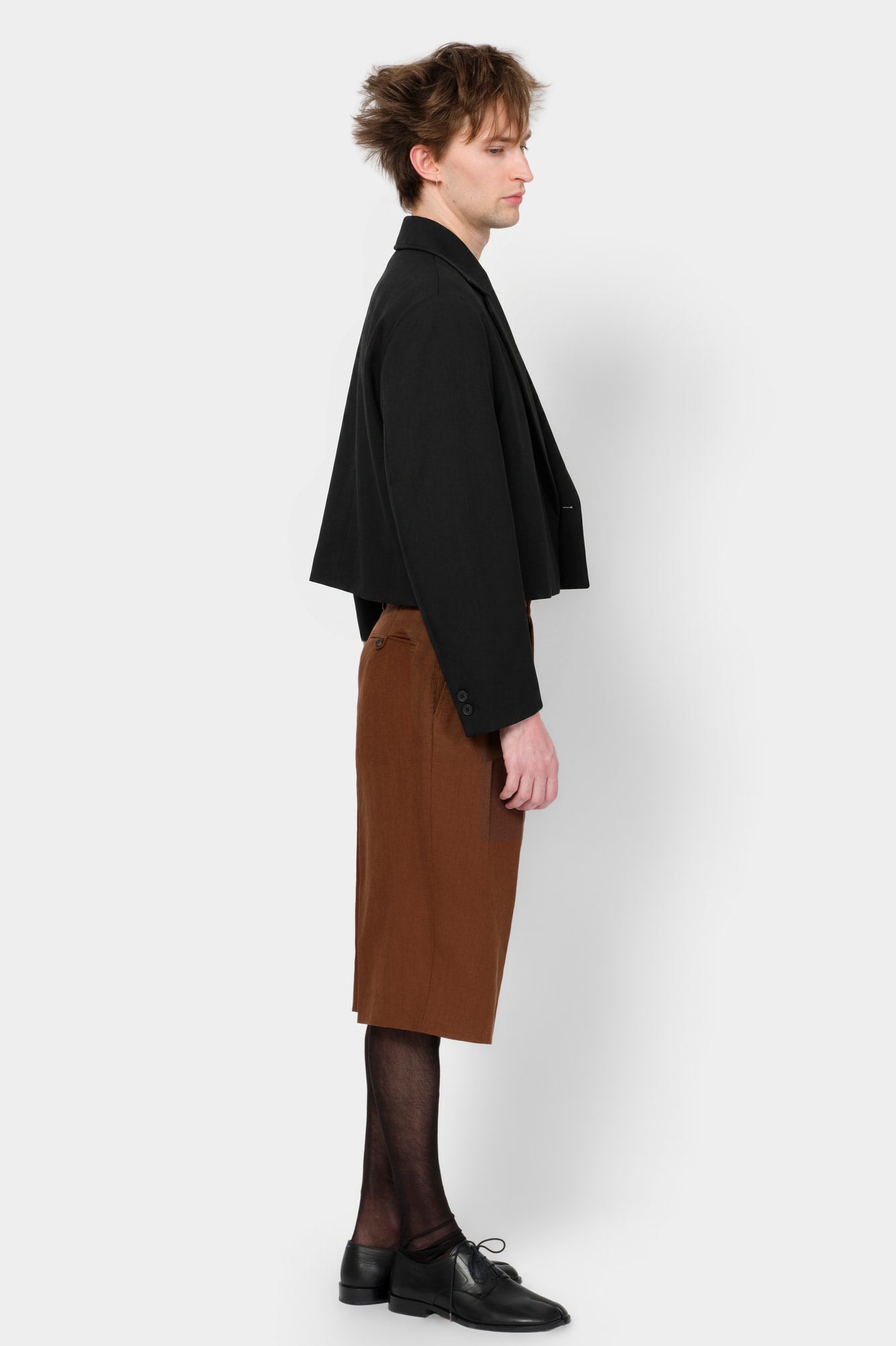 CUT-OFF OVERCOAT in black wool-silk mix