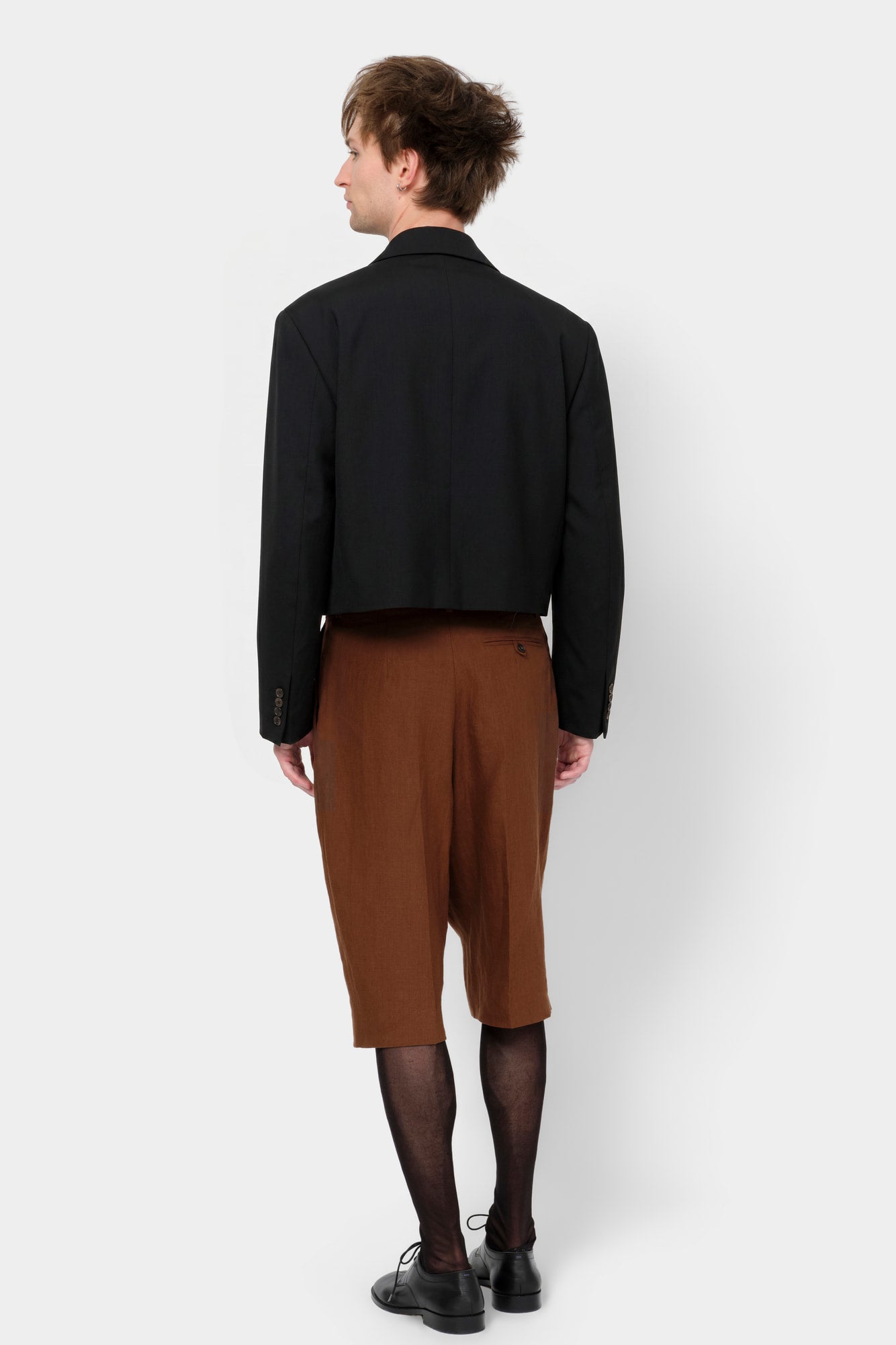 CUT-OFF OVERCOAT in black wool-silk mix