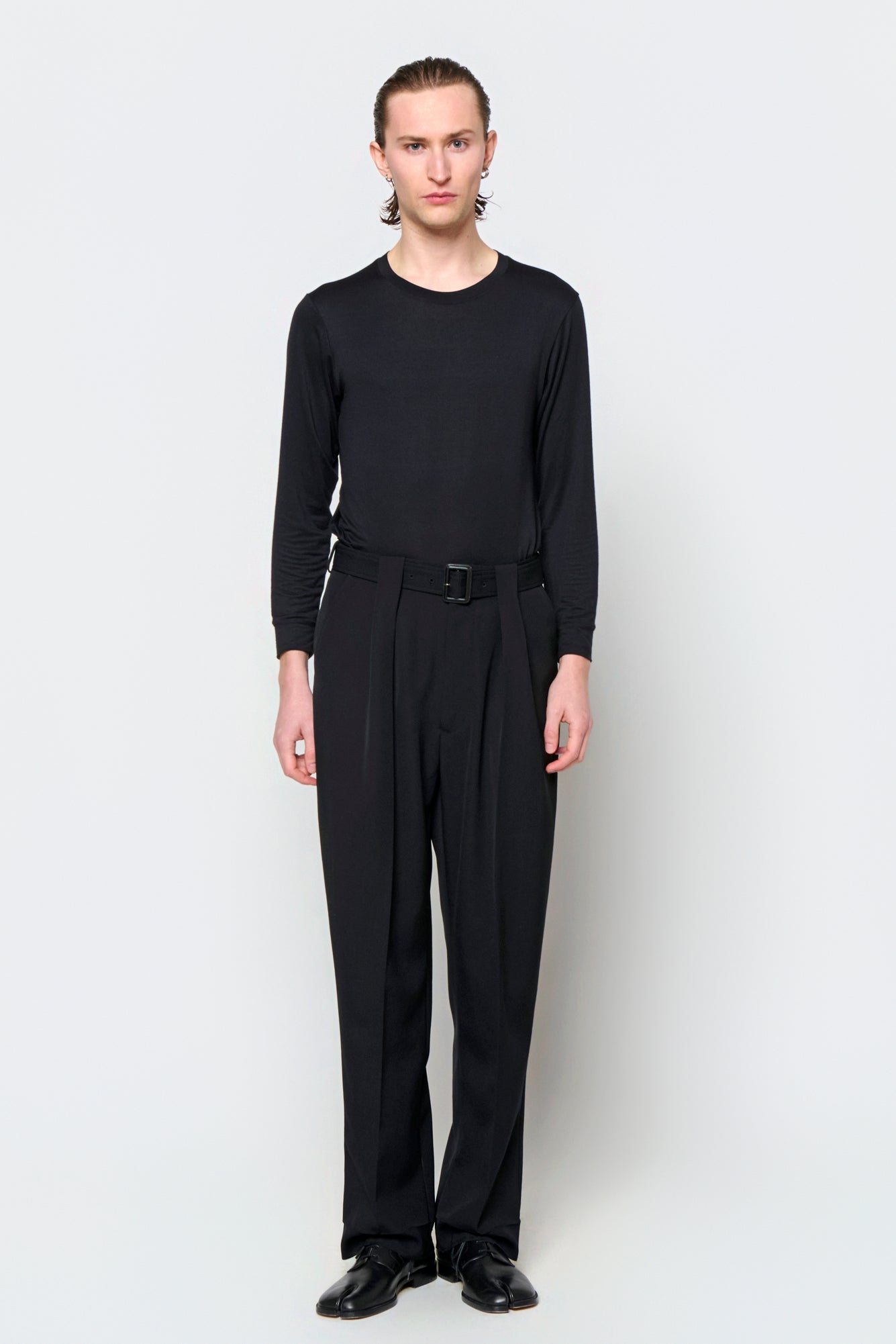 BELTED TAILORED TROUSERS in black wool gabardine