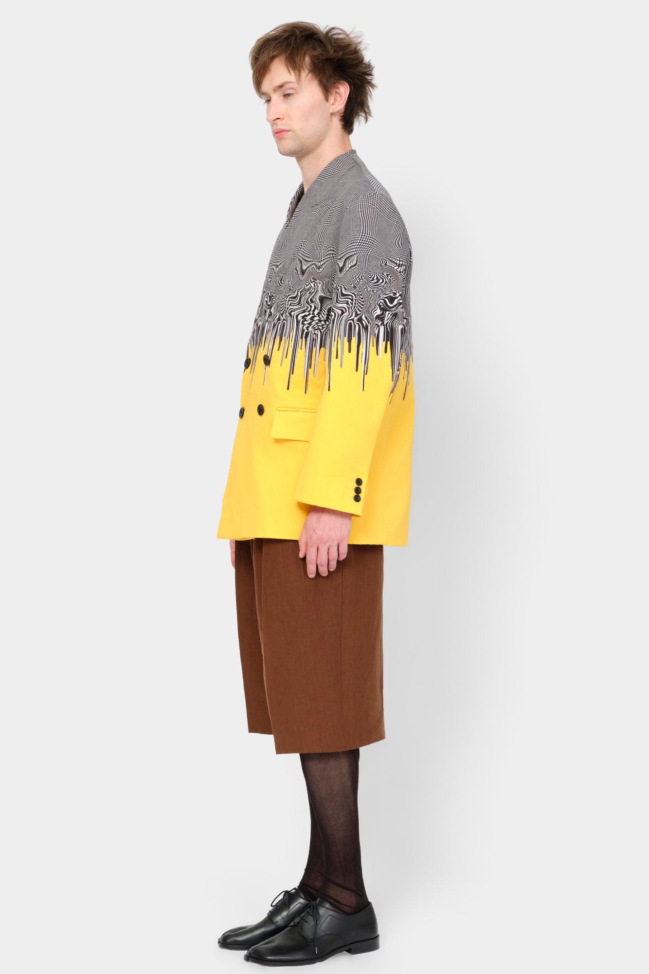 Double-breasted jacket featuring a digitally printed Glen check