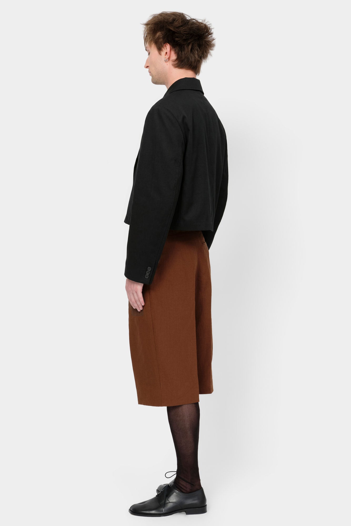 CUT-OFF OVERCOAT in black wool-silk mix