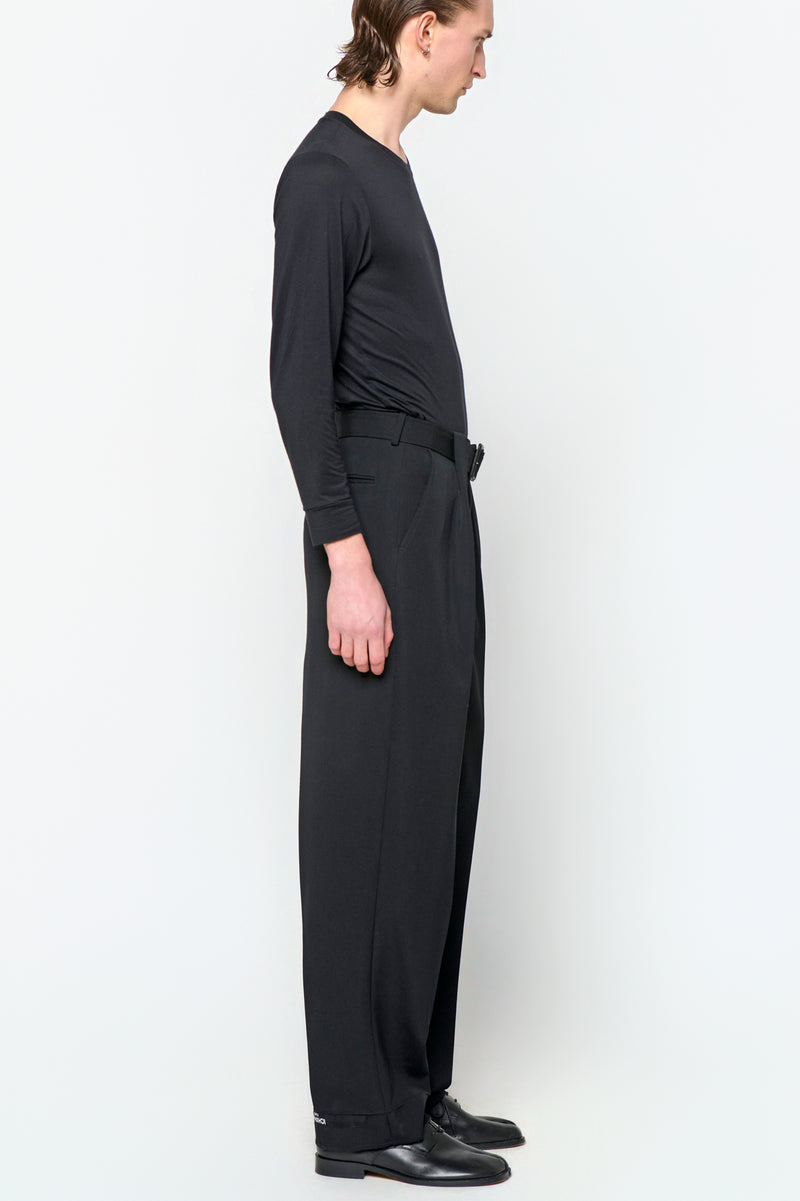 BELTED TAILORED TROUSERS in black wool gabardine