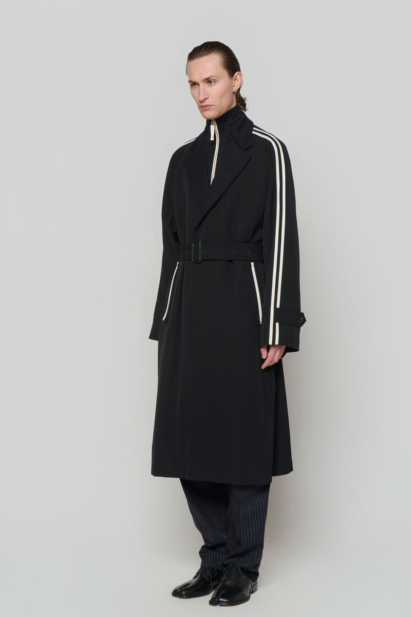 SINGLE-BREASTED RAGLAN OVERCOAT in wool gabardine with knitted collar