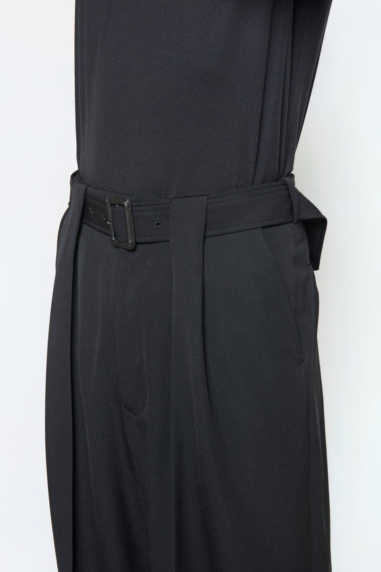 BELTED TAILORED TROUSERS in black wool gabardine